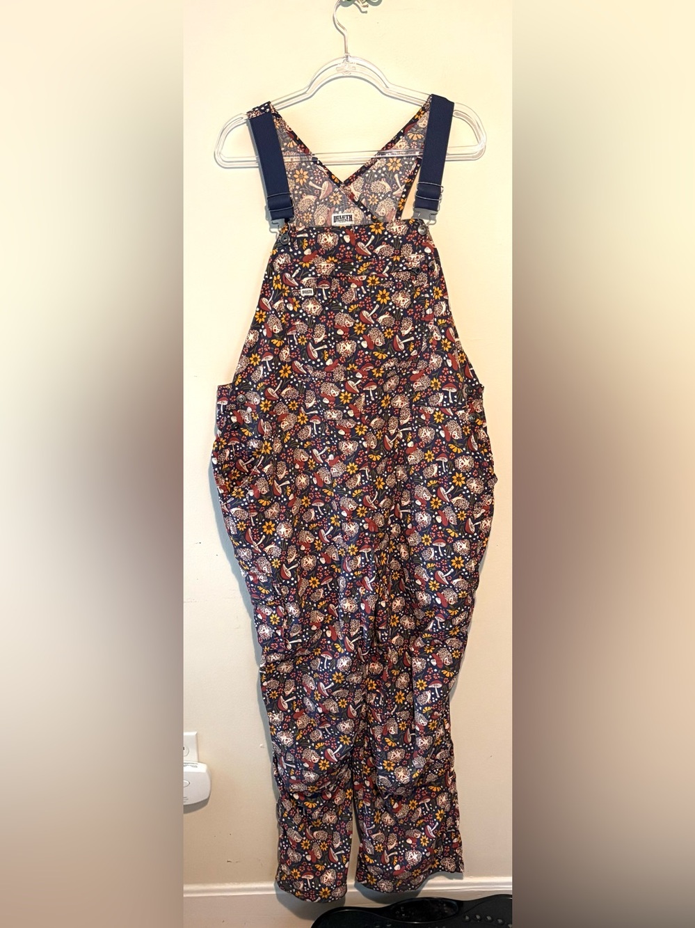 Duluth Heirloom gardening bib overalls in dusk blue with hedgehogs and mushrooms - Picture 2 of 7